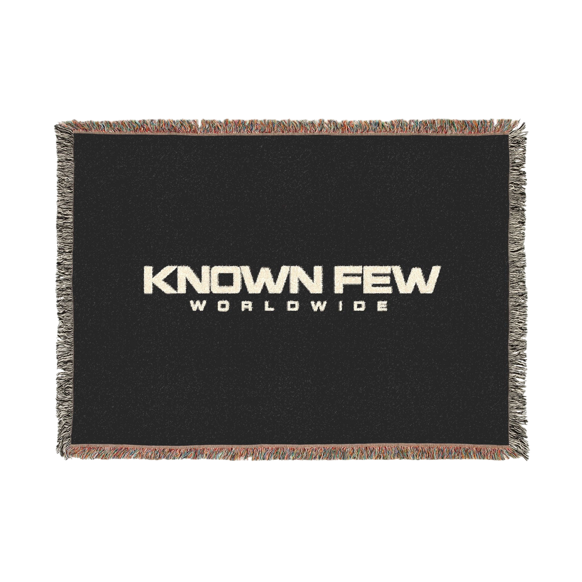 Known Few Worldwide heavyweight cotton blanket in black with a woven logo and colorful fringed edges.