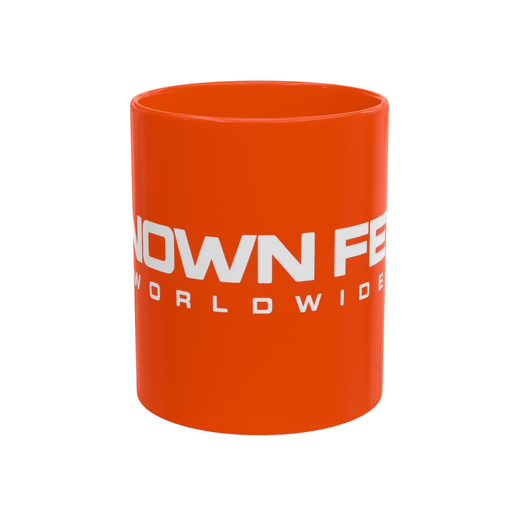 Known Few Worldwide 11 oz orange ceramic mug with white brand logo and classic C-handle design
